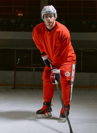 man-on-ice-hockey-field-playing-wear-ice-hockey-uniform