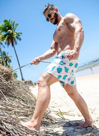 man-on-beach-outdoor-wear-sublimation-shorts