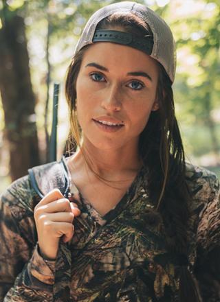 woman-hunter-in-jungle-posing-wear-hunting-shirt