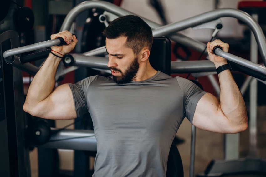 man workout in gym wear sweat wicking t-shirt